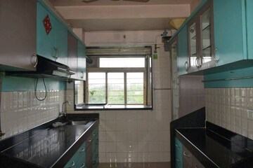 Kitchen in 2 BHK Apartment at Raheja Gardens Fantasia, Raghunath Nagar – for Rent