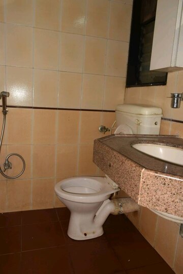 Bathroom in 2 BHK Apartment at Raheja Gardens Fantasia, Raghunath Nagar – for Rent