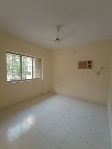 Bedroom in 2 BHK Apartment at Lokpuram CHS, Vasant Vihar – for Rent