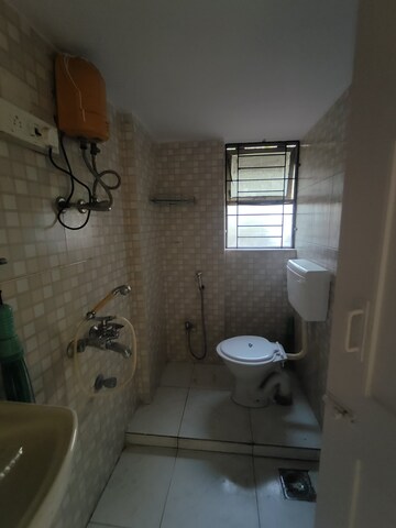 Living Room in 2 BHK Apartment at Lokpuram CHS, Vasant Vihar – for Rent