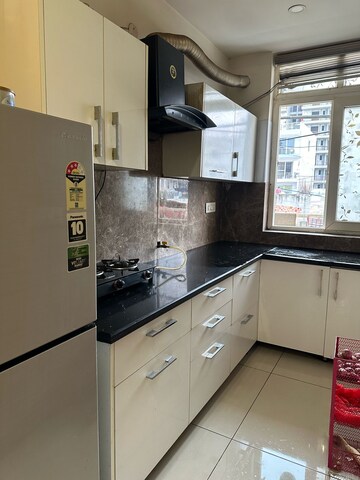 Kitchen in 3 BHK Builder Floor at Motia Blue Ridge, Dhakoli – for Sale