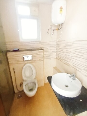 Bathroom in 2 BHK Apartment at MI Rustle Court, Gomti Nagar – for Sale