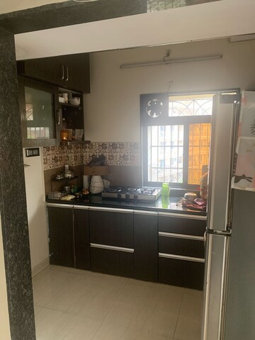 Kitchen in 1 BHK Apartment at Raunak Bliss, Ghodbunder Road – for Rent