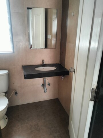 Bathroom in 2 BHK Apartment at Rama Celestial City, Ravet – for Rent