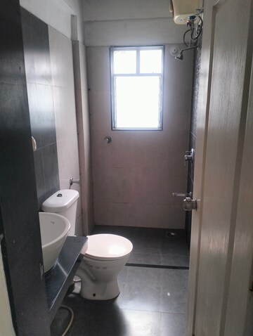 Bathroom in 2 BHK Apartment at Rama Celestial City, Ravet – for Rent