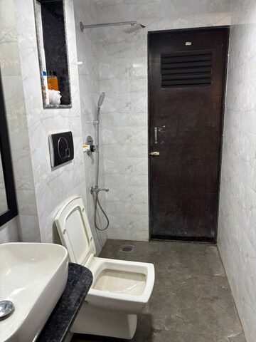 Bathroom in 1 BHK Apartment at Raunak Bliss, Ghodbunder Road – for Rent