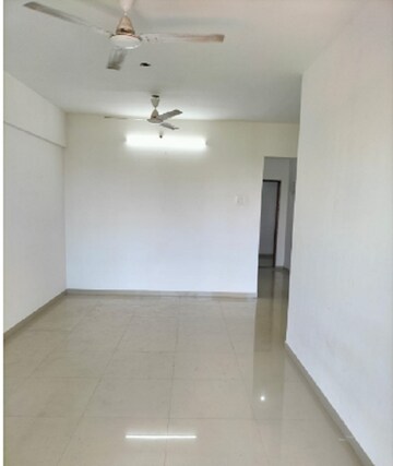 Living Room in 1.5 BHK Apartment at Man Opus, Mira Road – for Sale