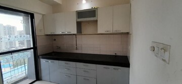 Kitchen in 1.5 BHK Apartment at Man Opus, Mira Road – for Sale