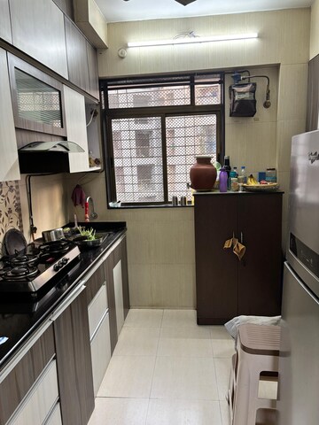 Kitchen in 1 BHK Apartment at Raunak Bliss, Ghodbunder Road – for Rent