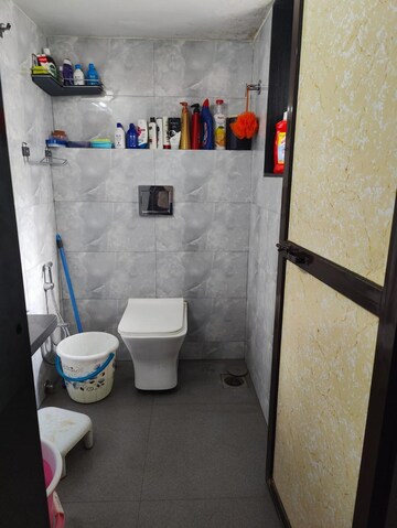 Bathroom in 1 BHK Apartment at Raunak Bliss, Ghodbunder Road – for Rent