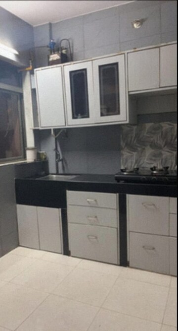 Kitchen in 2 BHK Apartment at Piramal Vaikunth Vama, Balkum Pada – for Rent