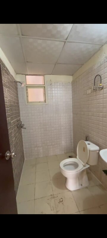 Bathroom in 2 BHK Apartment at Antriksh Golf View, Sector 78 – for Rent