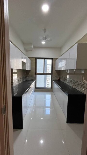 Kitchen in 2 BHK Apartment at Rajesh Raj Infinia, Malad West – for Rent
