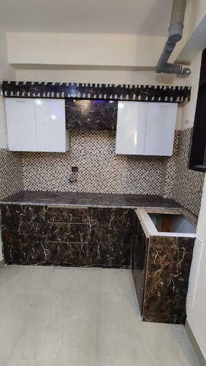 Kitchen in 2 BHK Apartment at DMD Hometech Awas Yojna, Sector 73 – for Sale