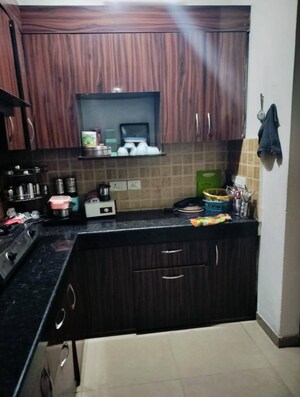 Kitchen in 4 BHK Apartment at Mahagun Mywoods, Sector 16c Greater Noida – for Sale