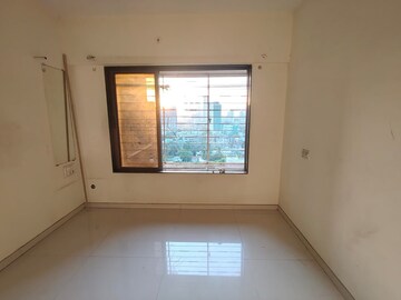 Room in 2 BHK Apartment at Hira Kutir CHS, Malad East – for Rent