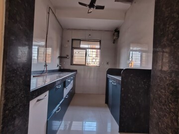 Kitchen in 2 BHK Apartment at Hira Kutir CHS, Malad East – for Rent