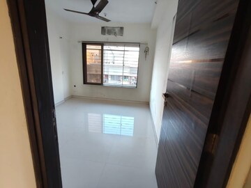 Room in 2 BHK Apartment at Hira Kutir CHS, Malad East – for Rent