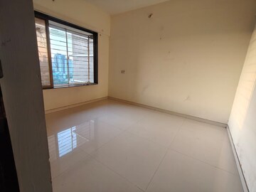 Room in 2 BHK Apartment at Hira Kutir CHS, Malad East – for Rent