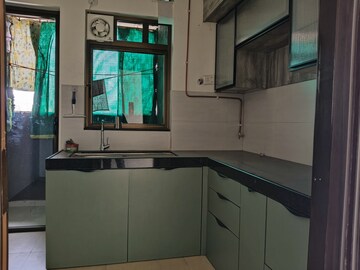 Kitchen in 2 BHK Apartment at Mahindra Roots, Kandivali East – for Rent