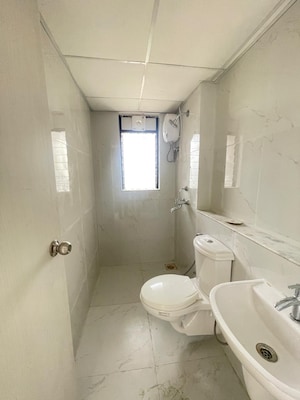 Bathroom in 1 BHK Apartment at Runwal Gardens, Dombivli East – for Sale