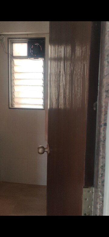 Room in 2 BHK Apartment at Karmvir Avant Western Woods, Dahisar East – for Rent