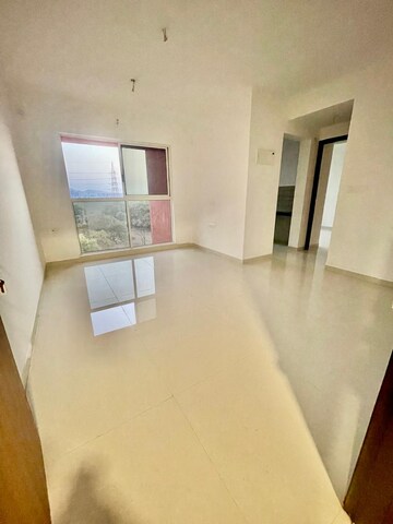 Living Room in 1 BHK Apartment at Lodha Codename Premier, Dombivli East – for Rent