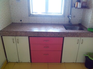 Kitchen in 1 BHK Apartment at Rashmis Star City, Naigaon East – for Rent