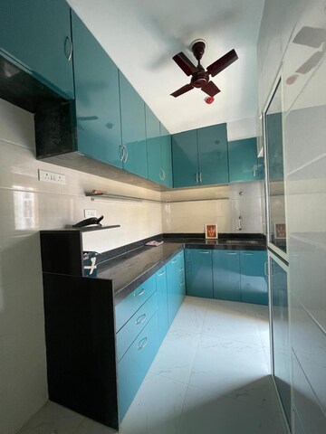 Kitchen in 3 BHK Apartment at Runwal Gardens, Dombivli East – for Rent