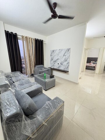 Living Room in 2 BHK Apartment at Signature The Millennia 2, Sector 37d – for Rent