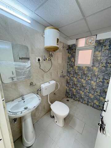 Bathroom in 2 BHK Apartment at Signature The Millennia 2, Sector 37d – for Rent