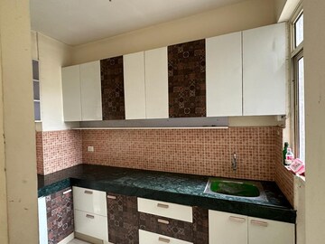 Kitchen in 2 BHK Apartment at Conscient Habitat Residences, Sector 78 – for Sale