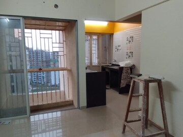 Living Room in 1 BHK Apartment at JSB Nakshatra Greens, Naigaon East – for Rent