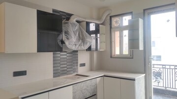 Kitchen in 3 BHK Builder Floor at Sector 15 – for Sale