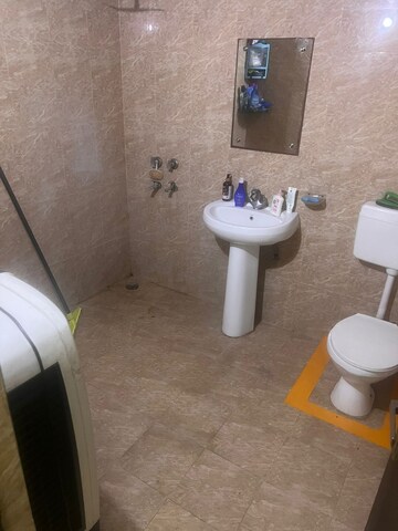 Bathroom in 3 BHK Apartment at Noida Central – for Rent