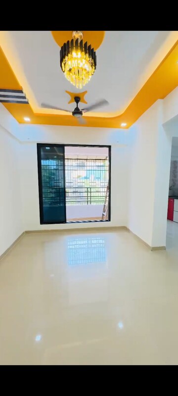 Living Room in 1 BHK Apartment at Kalp Nisarg Phase I, Shirgaon – for Rent