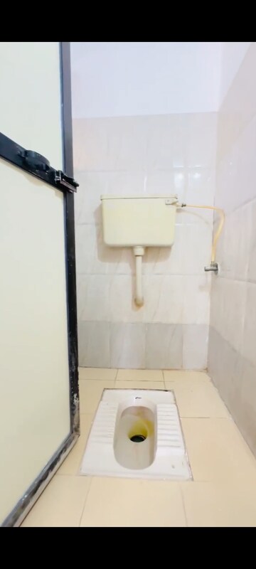 Bathroom in 1 BHK Apartment at Kalp Nisarg Phase I, Shirgaon – for Rent