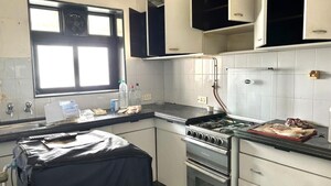 Kitchen in 3 BHK Apartment at Pushpa Milan, Worli – for Sale