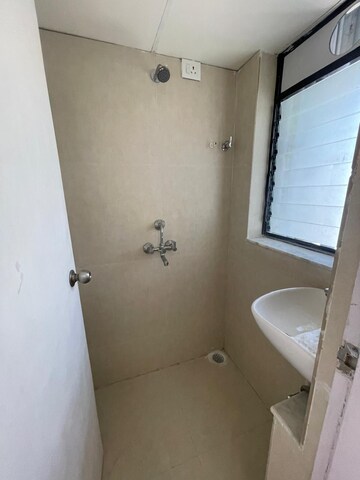 Bathroom in 1 BHK Apartment at Runwal My City, Dombivli East – for Rent