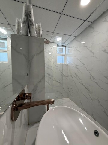 Bathroom in 4 BHK Apartment at Capital Royal Casa, Gms Road – for Sale