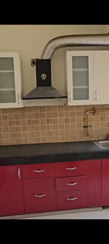 Kitchen in 3 BHK Apartment at Mahagun Mywoods, Sector 16c Greater Noida – for Rent