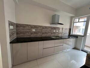 Kitchen in 3 BHK Apartment at Shapoorji Pallonji Joyville Phase 2, Sector 102 – for Sale