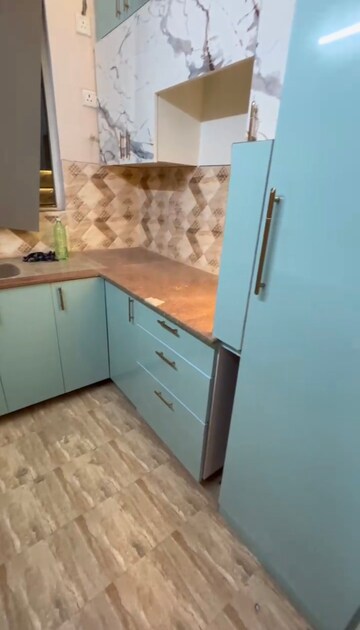Kitchen in 2 BHK Apartment at Amrapali Golf Homes, Sector 4 Greater Noida – for Rent