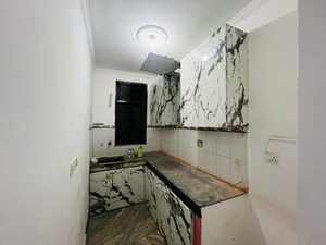 Kitchen in 2 BHK Builder Floor at Chattarpur – for Sale