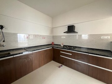 Kitchen in 3 BHK Apartment at Gera World of Joy, Kharadi – for Rent