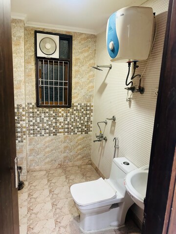 Bathroom in 3 BHK Builder Floor at Chattarpur – for Rent