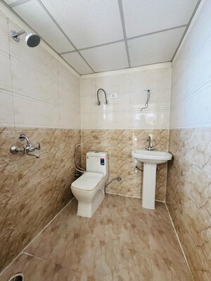 Bathroom in 3 BHK Apartment at Javin Raj Empire, Raj Nagar Extension – for Sale