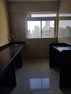 Kitchen in 1 BHK Apartment at Sugee Atharva, Gokhale Road – for Sale