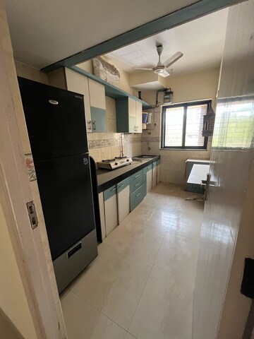 Kitchen in 1 BHK Apartment at K Raheja Palm Court, Malad West – for Rent