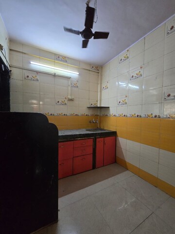 Kitchen in 1 BHK Apartment at Parsik Nagar – for Sale